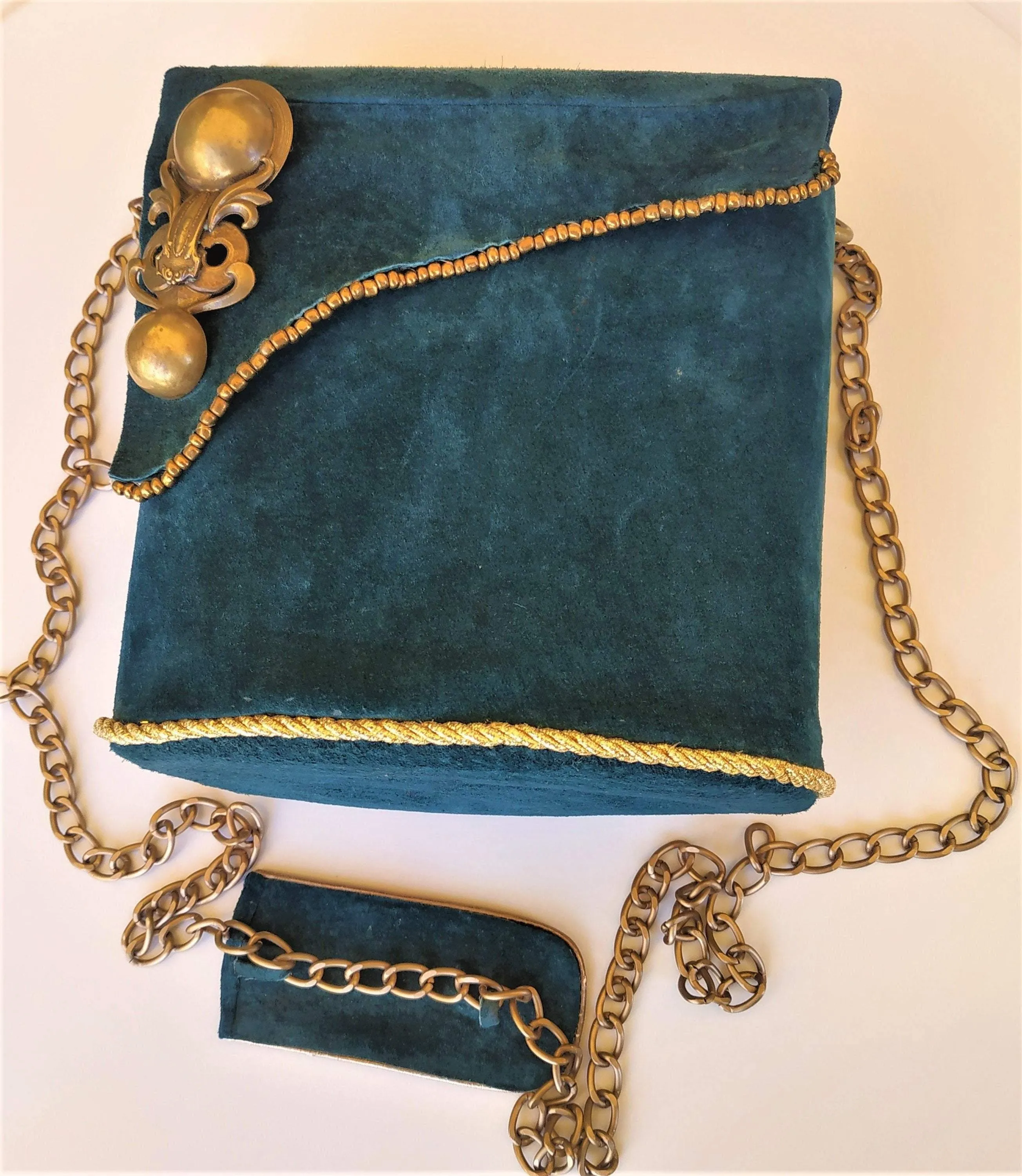 Exclusive Suede sea-green box-bag with a long chain handle