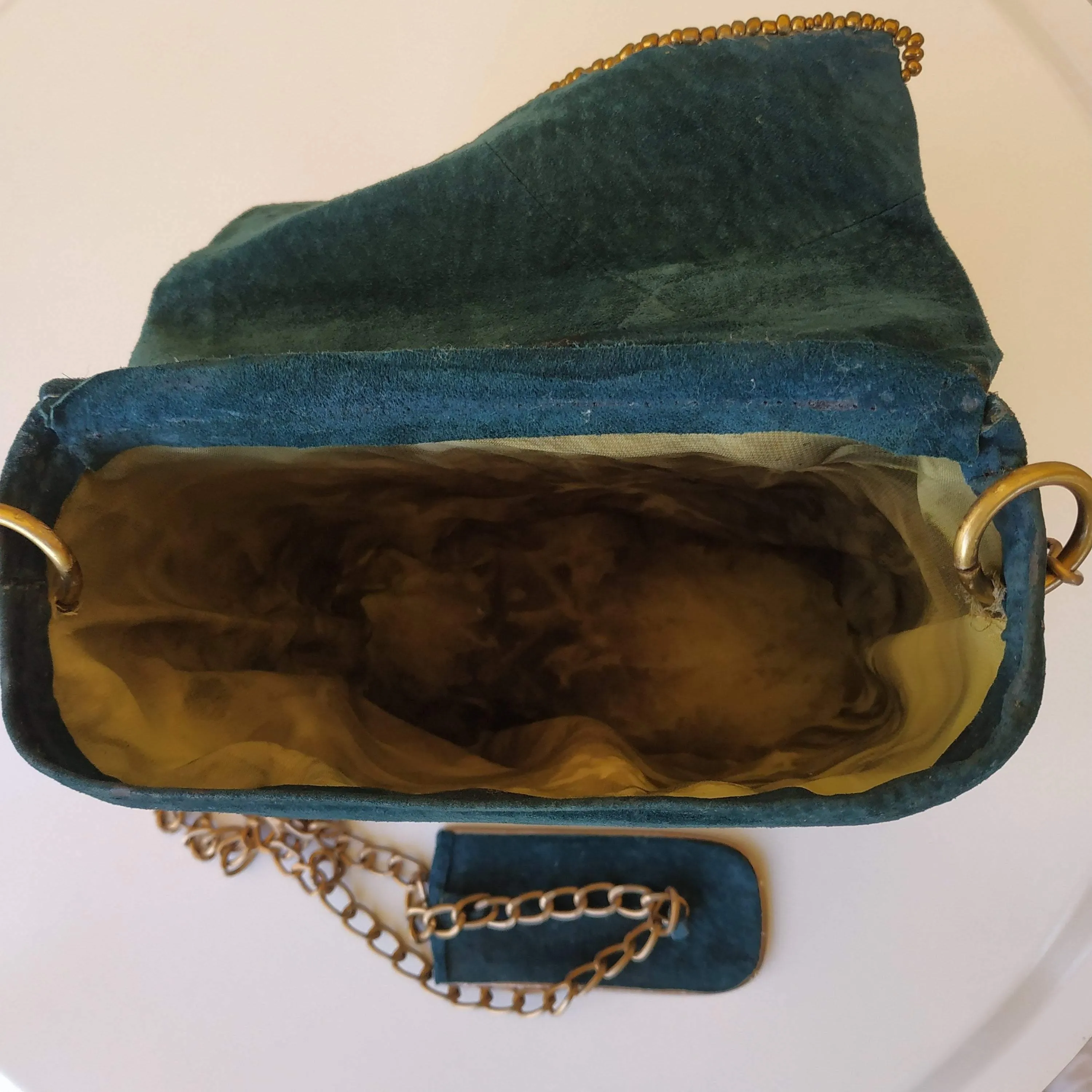 Exclusive Suede sea-green box-bag with a long chain handle
