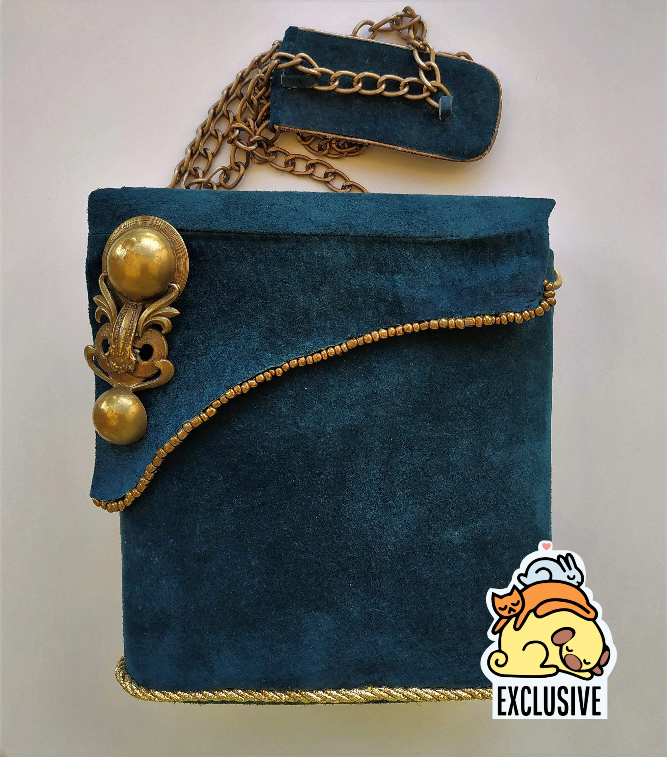 Exclusive Suede sea-green box-bag with a long chain handle
